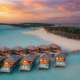 Ocean pool villas at sunset at Nala Maldives adults only resort