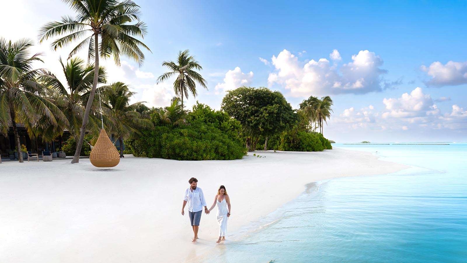 A couple on a beach Nala Maldives Island resort